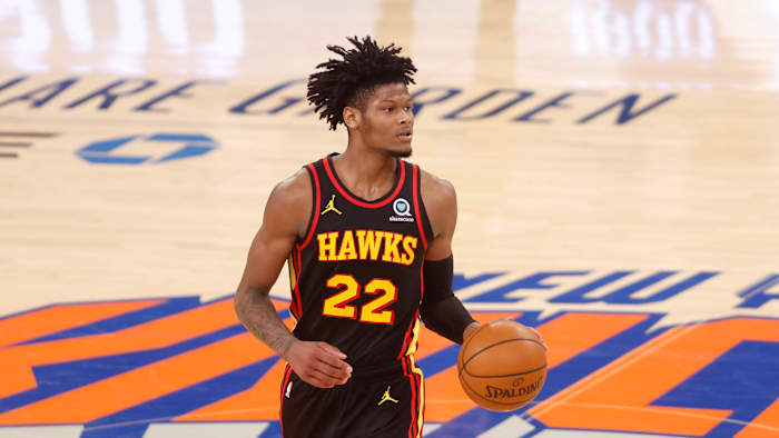 Atlanta Hawks' Cam Reddish (22) controls the ball against the New York Knicks